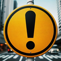 Un anneau avec un point d’exclamation qui signifie “Attention”
